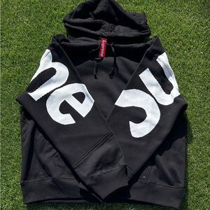 Supreme Black Hoodie with Red Tag